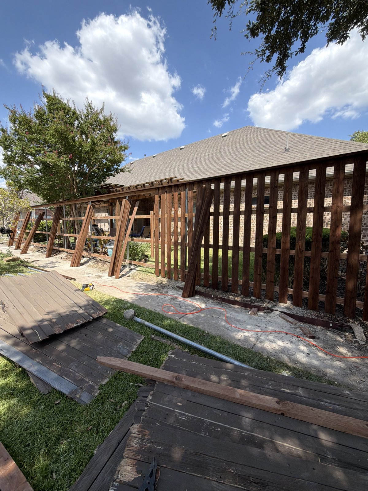 Wood fence panels removed — before